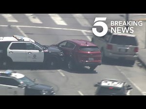 LAPD Cruiser Rams Stolen Vehicle in South L.A. Pursuit