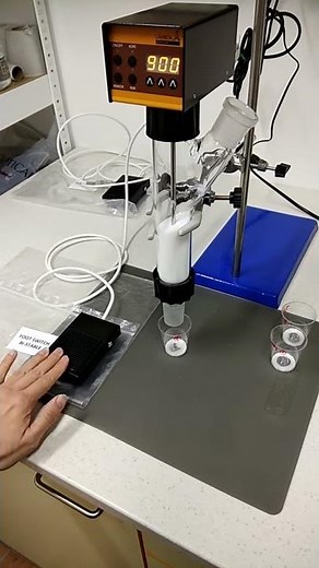 Automated powder dispensing with bistable footswitch