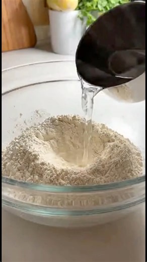 Homemade pizza dough Ingredients: - 1 and 2/3 cups warm water (400ml) - 1 and 1/2 tablespoons extra virgin olive oil (20g) - 2 teaspoons instant yeast (7g) - 1 tablespoon salt (15g) - 2 tablespoons granulated sugar (20g) - 5 and 3/4 cups all-purpose flour (680g) Instructions: 1. Mix Ingredients: - In a large bowl, mix warm water, olive oil, yeast, salt, and sugar. - Gradually add the flour, mixing until a dough forms. 2. Knead Dough: - Wet your hand and knead the dough until it's smooth. 3. Firs