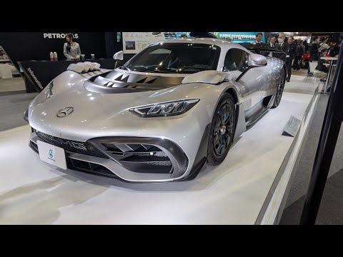 公道を走るF1ごオートサロンに展示限定275台