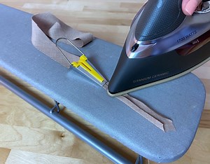 How To Apply A Bias Bound Seam Finish In Dressmaking