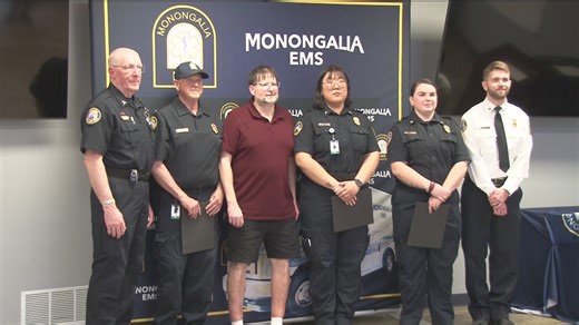 Heroes honored for saving man's life at WVU basketball game