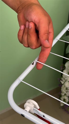 Entice Studio on Instagram: "Fixing a broken line on a clothes drying rack #fix #clothes #trick #dryingrack"