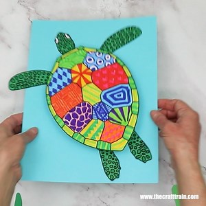 Turtle pattern art project. Make yours bright and colourful, or go for more realistic turtle colours—it's up to you! The template is available in our printables store. | The Craft Train