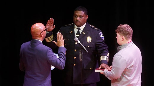 Lenny Gunther flanked by family as he is sworn in as Savannah's next police chief