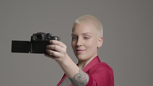 Free stock video - Female model vlogging with a dslr