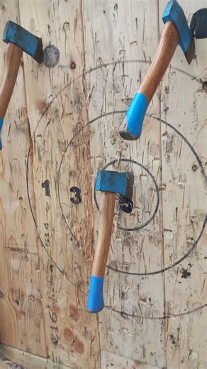 Could you do this? 3 axes, 3 targets = the bull and 2 clutches. #axethrowing #irelandtravel #instant_ireland #govisitdonegal #discoverbundoran #KeepDiscovering #axe #bullseye #targetsport #WildAtlanticWay #seeyouinmarch2026 | The Rusty Axe