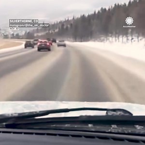 Watch as a Subaru loses control during snowy conditions on Interstate 70 in Colorado. The driver is seen changing lanes before losing control, veering off the road, and eventually back onto the highway. | AccuWeather