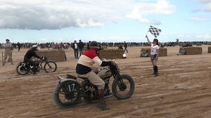Video. WATCH: Vintage cars and motorbikes race on Normandy Beach