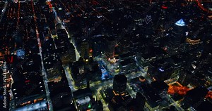 Night view of a metropolis with well-lit streets. Scenery of Philadelphia, Pennsylvania, USA from top.