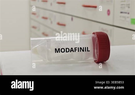 MODAFINIL tablets used to treat narcolepsy and promote wakefulness a central nervous system stimulant Stock Video Footage - Alamy