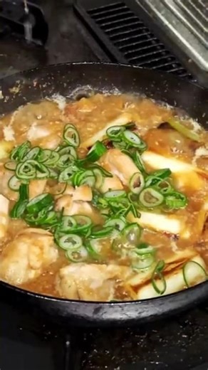 Delicious daikon radish simmered in miso sauce with chicken thighs and green onions