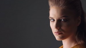 closeup face portrait of beautiful young woman