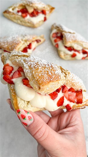 42K views · 461 reactions | Strawberry Cheesecake Turnover RECIPE: https://badbatchbaking.com/strawberry-cheesecake-turnovers/ These Strawberry Cheesecake Turnovers feature fresh strawberries and creamy cheesecake stuffed in flaky, buttery puff pastry triangles. This fresh, light treat is easy to whip up and perfect for spring and summer. #turnovers #cheesecakelovers #strawberrycheesecake #EasyDesserts | Bad Batch Baking by Mallory Austin | Facebook