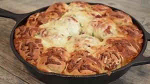 The ultimate Game Day appetizer - Pizza Skillet Monkey Bread! FULL RECIPE: http://bit.ly/pizzaskilletmonkeybread Click here for where to buy Bridgford® Parkerhouse Rolls: bit.ly/BridgfordWhereToBuy | Bridgford Foods Corporation
