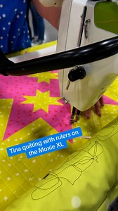 How fun is this?! Sam and Tina created this quilt pattern together! Here, you can see Tina using her Handi Quilter ruler with the Moxie XL to follow the quilting plan. #Quilting | Handi Quilter