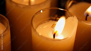 Endless Flicker 4K Virtual Video Animation of Multiple Burning Candles with Shallow Depth
