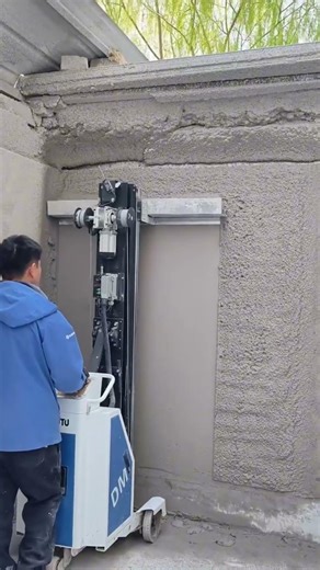 plastering process on walls with a plastering machine
