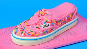 14M views · 29K reactions | I mainly make decorated cookies but from time to time I challenge myself with a fondant cake. This time it's not just any cake, I made a Shoe Cake with Sprinkles! I really wish these Vans Shoes came in my size. Recipes and tools : https://www.hanielas.com/2016/04/vans-shoe-cake/ | Haniela's | Facebook