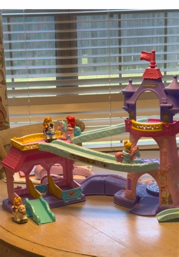 the Klop Klop Castle = ICONIC. It's really having a comeback moment. The it girl of vintage toys. Do I sell her or keep her? My girls adored this toy! @Fisher-Price #klopklop #vintagetoys #fisherprice #disneyprincess #littlepeople