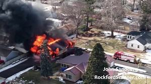 https://rockfordscanner.com Drone Video: John Sandberg Active Garage Fire with Vehicles Inside Prompts MABAS Response in Machesney Park MACHESNEY PARK, IL — Fire crews are actively battling a garage fire in the 1300 block of Harlem Road in Machesney Park after reports indicated two vehicles were inside the structure at the time of the fire. According to initial emergency dispatch information, the incident was significant enough to be paged out as a MABAS (Mutual Aid Box Alarm System) response, i