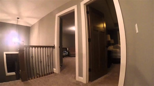 Toddler wears GoPro while playing hide-and-seek.