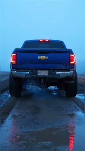 Giant Step: A Blue GMC vs the Mud