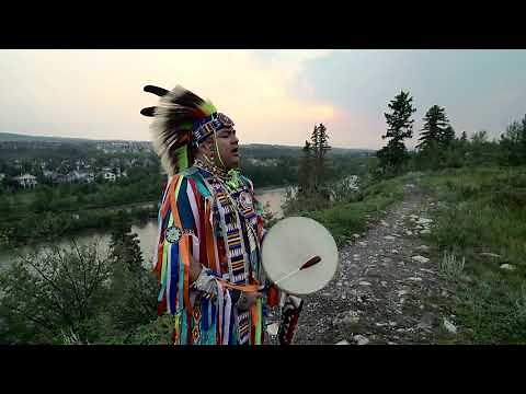 Native hand drumming and singing