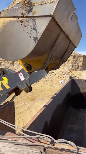 Heavy Machinery in Action: Front Loader and Backhoe