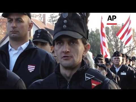 Villagers and far right members march to remember Hungary's WW2 ruler