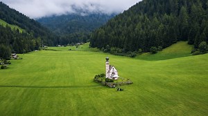A tiny church in a giant valley