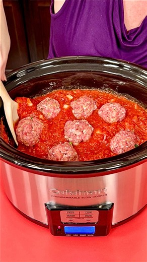 Crockpot stuffed meatballs in rich tomato sauce