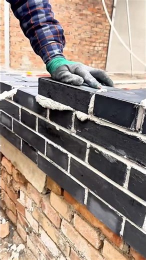 Exposed brick installation technique with mortar for a neat strong finish #shorts