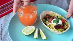 Mexican food Taco boat Tortilla served with Margarita. Food background and texture