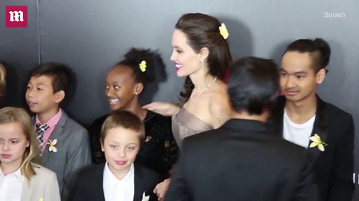 Angelina Jolie shows off her massive tattoo at premiere in NY