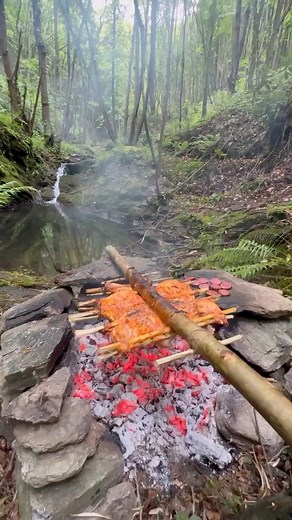 2.5M views · 66K reactions | Chicken Skewered over an Open Fire?!  #chicken #cooking #outdoorcooking #asmrcooking #knifeskills | The Nikos Knife | Facebook
