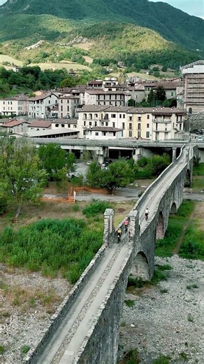 Across the Ponte Vecchio - the legendary Devil’s Bridge in Bobbio on the Trans-Europa Cycling Tour