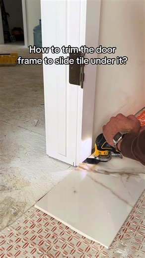 How to trim the door frame to slide tile under it?✅🤝#howto #tips #construction #tiles #lifehacks
