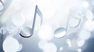 Silver musical notes on a light bokeh background, for serene music videos, relaxing and calming video content. Animated elegant silver notes floating in soft lighting