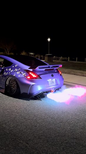 J A S M I N ❀ on Instagram: "@hotlicksexhaust with the flamethrower kit ❤️‍🔥🤩 you know you want it, use code JSMNZXR for $$ off and make your car spit some mf flaaaames 🔥🥵 shop my merch at www.JSMNZXR.com ✨ ♡ ♡ ♡ #z34 #z33 #350z #370z #400z #nissan #jdm #nismo #fairlady #zociety #jdm #jdmgram #car #japan #carsofinstagram #drift #jdmcars #carwraps #tune #airlift #vq #bagged #explorepage #cars #carswithoutlimits #hotlick #flame"