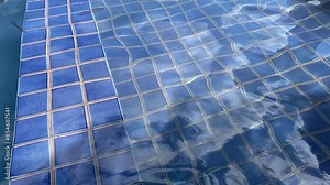 Abstract reflection on the water in swimming pool