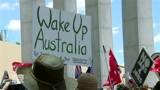 Angry protesters stand-off with police at Federal Parliament