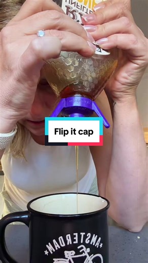 Flip-It Bottle Emptying Kit is the simple tool that helps you get every last drop out of bottles like honey, ketchup, syrup, shampoo, and more. Instead of banging the bottle on the counter or waiting forever for thick liquids to drip down, this clever flip cap turns your bottle upside down so gravity does the work. The built-in valve opens when you squeeze and closes automatically to prevent messy spills. Just attach the Flip-It cap to your bottle, flip it over, and squeeze to get every last dro