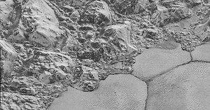 Highest-resolution images of Pluto zoom in on mountains, craters and icy plains