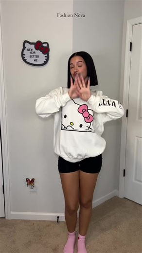 Nights out are for @Fashion Nova 😍🌙 . Items: . Hello Kitty Glitter Crew Neck Sweatshirt - White Hello Kitty Xmas 5 Pack Socks - Red/combo You're A Star Marled Sweater - Olive/combo Stella Faux Leather Moto Jacket - Black #fashion #grwm #FN #fyp #outfitideas