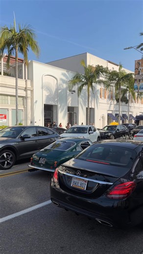 Ferrari 250 GT SWB Berlinetta spotted driving through traffic on Rodeo Drive, a true motorsport icon casually blending into Beverly Hills. Current market value sits around $10–14 million, depending on history and condition, making it one of the most valuable Ferraris ever built. This short-wheelbase V12 legend dominated early 1960s GT racing and is considered one of the most perfectly balanced Ferraris of all time. Seeing a car this rare actually being driven, not trailered, is what makes Rodeo