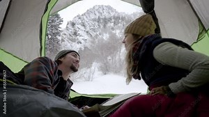 Man Gestures For His Girlfriend To Kiss Him, She Tries, But She Is Too Far, Makes A Joke Out Of It, He Pulls Her In Close