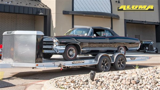 The Aluma 8200XL Executive Tilt Trailer. Haul your classic in style with this top of the line trailer. See our inventory http://www.northpointtrailers.com! #aluminumtrailers #carhauler #aluminumcarhauler #alumalife #aluma . . . #MadeInTheUSA #ClassicCars #Motorcycle | NorthPoint Auto & Equipment