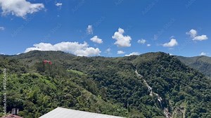 Video of beautiful landscapes of the Cocora Valley in Colombia. Travel and beautiful villages. Wax palm. National tree of Colombia.