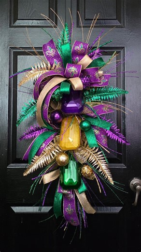 The Wreath Shop on Instagram: "Gems, glitter, and a whole lot of celebration! ✨💜💛💚 💎 💎 #Mardigras #mardigrasdecor #wreath #mardigras2025 #fattuesday"